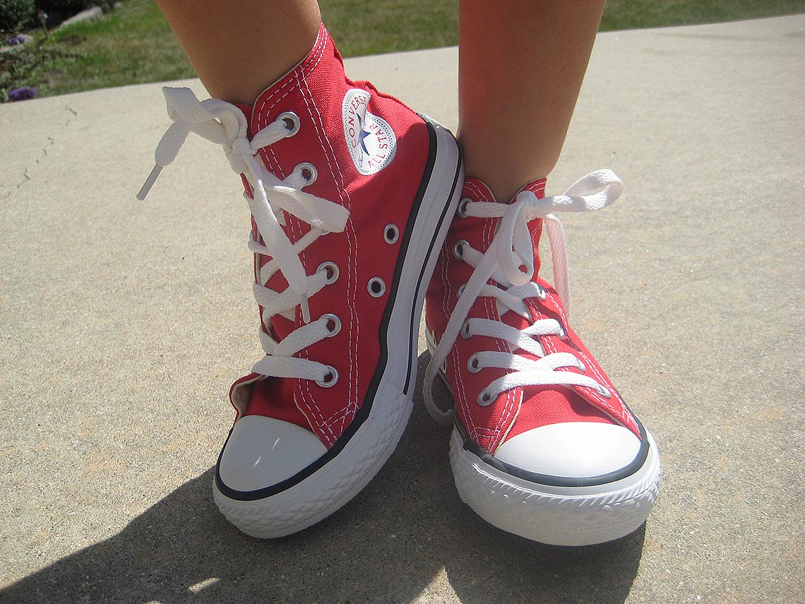 wearing red converse